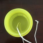 DIY Flip and Catch Step 3: Lid with knotted string inserted