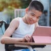 Child in a wheelchair using ACC