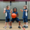 Young children playing basketball