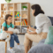 Therapist interviewing a small child